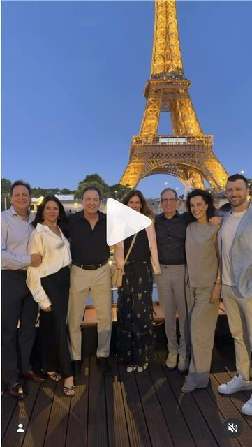 Bobby and family in front of the Eiffel Tower in Paris